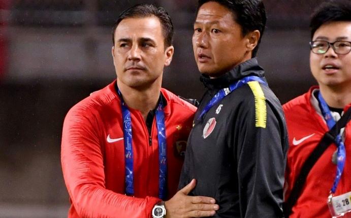 Fabio Cannavaro (l.) holt chinesische Meisterschaft