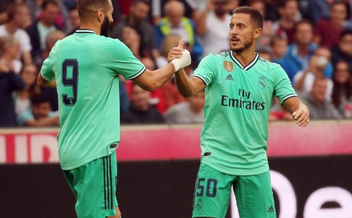 Real läuft gegen Espanyol in grünen Trikots auf