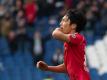 Genki Haraguchi jubelt nach seinem Tor zum 3:2-Endstand für Hannover 96 gegen Aue. Foto: Swen Pförtner/dpa
