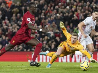 Liverpools Sadio Mané (l) erzielte das 2:0 gegen Sheffield United. Foto: Jon Super/AP/dpa Liverpools Sadio Mané (l) erzielte das 2:0 gegen Sheffield United. Foto: Jon Super/AP/dpa