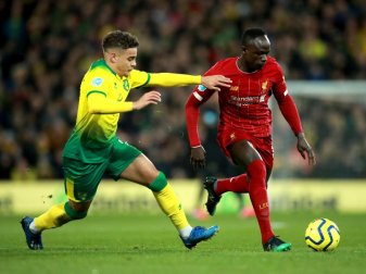 Sadio Mane (r) sorgte mit seinem Tor für den Liverpool-Sieg bei Norwich City. Foto: Adam Davy/PA Wire/dpa Sadio Mane (r) sorgte mit seinem Tor für den Liverpool-Sieg bei Norwich City. Foto: Adam Davy/PA Wire/dpa