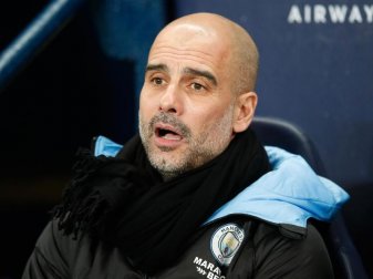 Trainer Pep Guardiola will seinen Vertrag bei Manchester City erfüllen. Foto: Martin Rickett/PA Wire/dpa