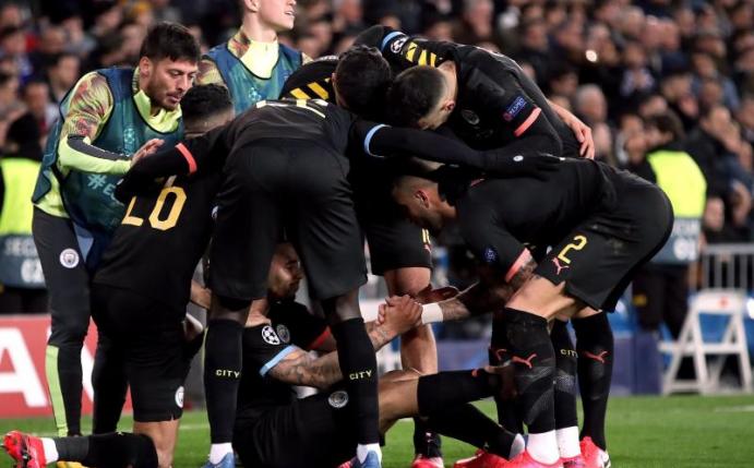 Die ManCity-Profis feiern den Auswärtssieg bei Real Madrid. Foto: Nick Potts/PA Wire/dpa