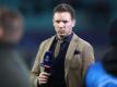 Leipzigs Trainer Julian Nagelsmann glaubt an eine Fortsetzung der Saison - wenn auch spät. Foto: Jan Woitas/dpa-Zentralbild/dpa