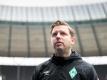 Werder-Trainer Florian Kohfeldt wartet noch auf eine Ausnahmegenehmigung für seinen Verein. Foto: Soeren Stache/dpa-Zentralbild/dpa