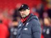 Jürgen Klopp freut sich wenigstens beim Online-Training über Kontakt zu seinen Spielern. Foto: Peter Byrne/PA Wire/dpa
