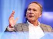 Man müsse wieder «puristischer werden», meint Hans-Joachim Watzke. Foto: Roland Weihrauch/dpa
