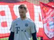 Torwart Manuel Neuer sieht die Fußballprofis in der Verantwortung. Foto: Peter Kneffel/dpa