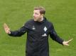 Werder-Coach Florian Kohfeldt glaubt an den Klassenerhalt. Foto: Clara Margais/dpa