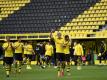 Der BVB um Torjäger Erling Haaland (M.) feierten einen Derbysieg vor leeren Rängen. Foto: Martin Meissner/AP-Pool/dpa