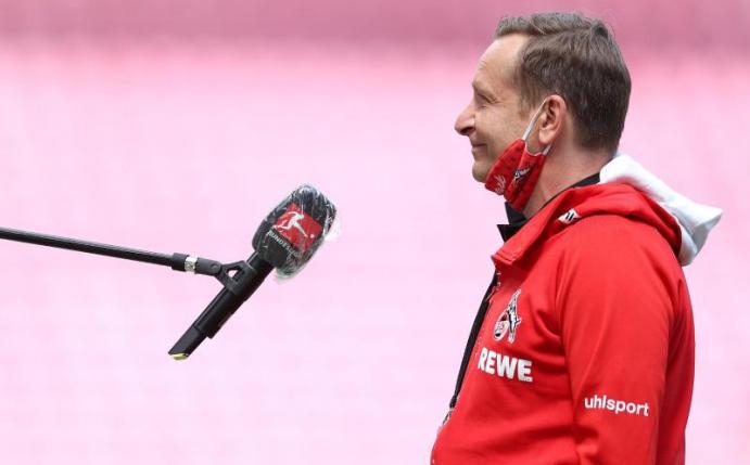 Horst Heldt hat den gelungenen Neustart der Fußball-Bundesliga nach der Corona-Zwangspause mit Freude kommentiert. Foto: Lars Baron/Getty/Pool/dpa