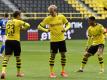 Die Dortmunder um Julian Brandt (M.) starteten nach der Corona-Pause mit einem Derbysieg. Foto: Martin Meissner/AP-Pool/dpa