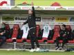 Trainer Florian Kohfeldt feierte mit Werder einen wichtigen Auswärtssieg. Foto: Thomas Kienzle/AFP-Pool/dpa