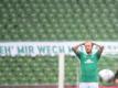 Philipp Bargfrede von Werder Bremen nach dem desaströsen Spiel gegen den VfL Wolfsburg. Foto: Patrik Stollarz/AFP/Pool/dpa