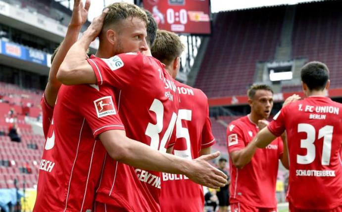 Starke Unioner: Am Ende gewannen die Berliner mit 2:1 in Köln. Foto: Martin Meissner/AP/Pool/dpa