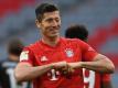 In den beiden ausstehenden Spielen der Bundesliga will Robert Lewandowski seine Trefferquote weiter ausbauen. Foto: Christof Stache/AFP/Pool/dpa
