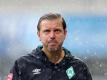 Trainer Florian Kohfeldt steht mit Werder Bremen unter Druck. Foto: Friedemann Vogel/EPA/Pool/dpa