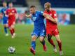 Fällt für RB Leipzig gegen den BVB aus: Konrad Laimer (r) in Aktion gegen Hoffenheims Pavel Kaderabek. Foto: Uwe Anspach/dpa-Pool/dpa