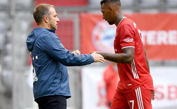 Erfolgs-Duo: Bayern-Coach Hansi Flick und Jérôme Boateng. Foto: Sven Hoppe/dpa-Pool/dpa