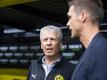 Müssen mindestens noch ein Jahr auf einen weiteren BVB-Titel warten: Lucien Favre (l) und Sebastian Kehl. Foto: Guido Kirchner/dpa