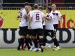 Die Nürnberger Spieler feiern ihr Tor zum 1:0 bei Holstein Kiel. Foto: Frank Molter/dpa