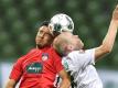 Im Relegationsspiel zwischen dem 1. FC Heidenheim und Werder Bremen wird es hart zur Sache gehen. Foto: Martin Meissner/AP POOL/dpa