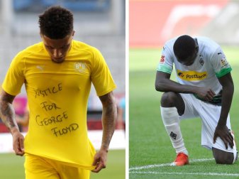 Dortmunds Jadon Sancho (l) trägt ein Trikot mit der Aufschrift «Justice for George Floyd», Der Gladbacher Marcus Thuram kniet auf dem Rasen. Foto: Lars Baron/Getty Images Europe/Pool/dpa;Martin Meissner/AP Pool Dortmunds Jadon Sancho (l) trägt ein Trikot mit der Aufschrift «Justice for George Floyd», Der Gladbacher Marcus Thuram kniet auf dem Rasen. Foto: Lars Baron/Getty Images Europe/Pool/dpa;Martin Meissner/AP Pool