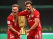 Riefen «We kick Corona» ins Leben: Joshua Kimmich (l) und Leon Goretzka. Foto: Alexander Hassenstein/Getty Images Europe/Pool/dpa