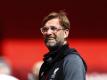 Fühlt sich vorerst sehr wohl beim FC Liverpool: Trainer Jürgen Klopp. Foto: Cath Ivill/Pool Reuters/AP/dpa