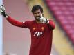 Liverpool-Keeper Alisson schwärmt von Trainer Klopp. Foto: Paul Ellis/Pool AFP via AP/dpa
