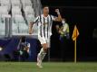 Cristiano Ronaldo bejubelt sein Tor für Juventus Turin zum 1:1 gegen Olympique Lyon. Foto: Antonio Calanni/AP/dpa