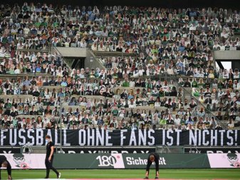 Die Rückkehr der Fans in deutsche Fußball-Stadien wird derzeit heiß debattiert. Foto: Federico Gambarini/dpa-Pool/dpa Die Rückkehr der Fans in deutsche Fußball-Stadien wird derzeit heiß debattiert. Foto: Federico Gambarini/dpa-Pool/dpa