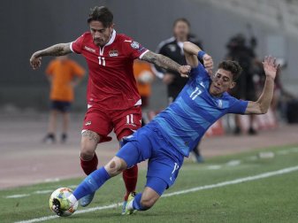 Der Grieche Kostas Tsimikas (r) wechselt zum FC Liverpool. Foto: Yorgos Karahalis/AP/dpa Der Grieche Kostas Tsimikas (r) wechselt zum FC Liverpool. Foto: Yorgos Karahalis/AP/dpa