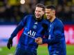 Julian Draxler (l) und Thilo Kehrer wollen mit PSG ins Champions-League-Finale. Foto: Guido Kirchner/dpa