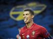 Cristiano Ronaldo traf zum 100. Mal für Portugal. Foto: Janerik Henriksson/TT NEWS AGENCY/AP/dpa