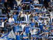 Fans des 1. FC Magdeburg beim Pokalspiel gegen Darmstadt. Auch in dieser Woche geht die Debatte um Zuschauer in den Stadien weiter. Foto: Swen Pförtner/dpa