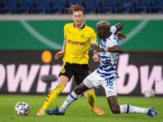 Der Einsatz von Marco Reus (l) zum Bundesliga-Start ist unsicher. Foto: Marius Becker/dpa