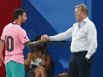Lionel Messi (l) und Neu-Barca-Coach Ronald Koeman. Foto: Joan Monfort/AP/dpa Lionel Messi (l) und Neu-Barca-Coach Ronald Koeman. Foto: Joan Monfort/AP/dpa