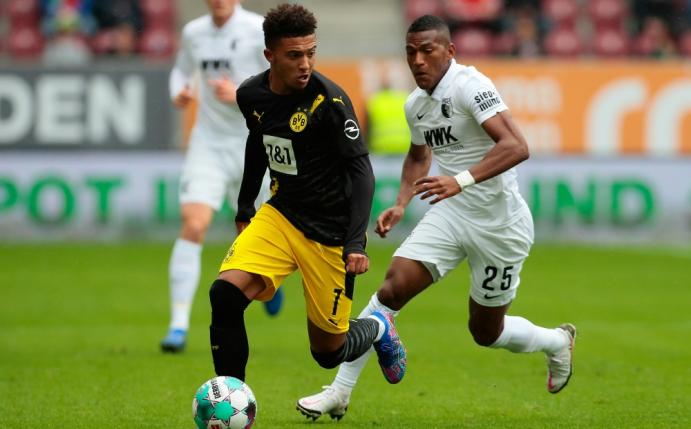 Wird bei Borussia Dortmund bleiben: Jadon Sancho (l.)
