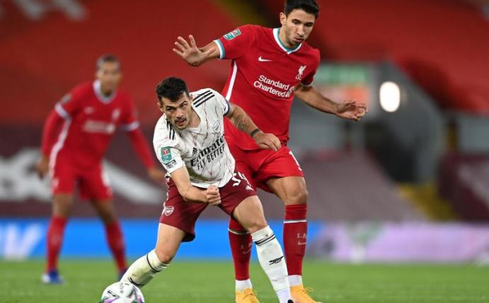 Marko Grujic (r) steht beim FC Liverpool unter Vertrag. Foto: Laurence Griffiths/PA Wire/dpa