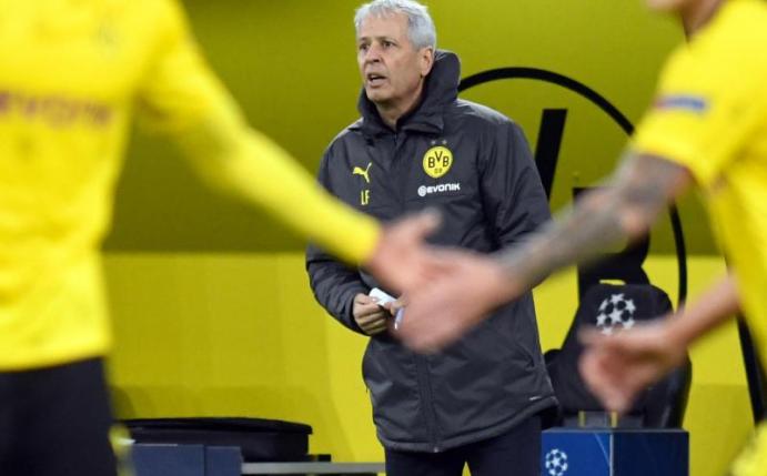 War trotz des glanzlosen Sieges sehr zufrieden: Dortmunds Trainer Lucien Favre. Foto: Bernd Thissen/dpa