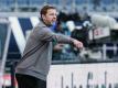 Bremens Trainer Florian Kohfeldt war mit dem Remis bei Eintracht Frankfurt zufrieden. Foto: Uwe Anspach/dpa