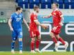 Max Kruse (r) jubelt über seinen verwandelten Elfmeter zum 1:0 für Union Berlin. Foto: Uwe Anspach/dpa