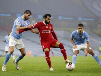Eine Meldung über einen positiven Corona-Test bei Mohamed Salah (M.) hat für Verwirrung gesorgt. Foto: Clive Brunskill/Pool Getty/dpa Eine Meldung über einen positiven Corona-Test bei Mohamed Salah (M.) hat für Verwirrung gesorgt. Foto: Clive Brunskill/Pool Getty/dpa