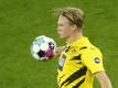 Sein Einsatz beim BVB-Gastspiel bei Hertha BSC ist offen: Torjäger Erling Haaland. Foto: Leon Kuegeler/Reuters-Pool/dpa