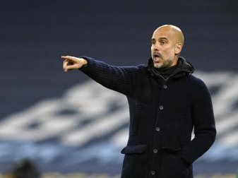 Hat bei Manchester City ein neues Arbeitspapier unterschrieben: Pep Guardiola. Foto: Dave Thompson/AP/dpa Hat bei Manchester City ein neues Arbeitspapier unterschrieben: Pep Guardiola. Foto: Dave Thompson/AP/dpa
