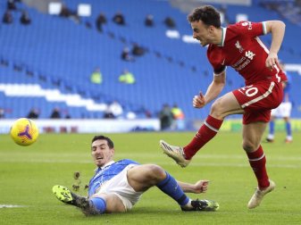 Diogo Jota (r) erzielte den Führungstreffer für den FC Liverpool bei Brighton & Hove Albion. Foto: Kirsty Wigglesworth/PA Wire/dpa Diogo Jota (r) erzielte den Führungstreffer für den FC Liverpool bei Brighton & Hove Albion. Foto: Kirsty Wigglesworth/PA Wire/dpa