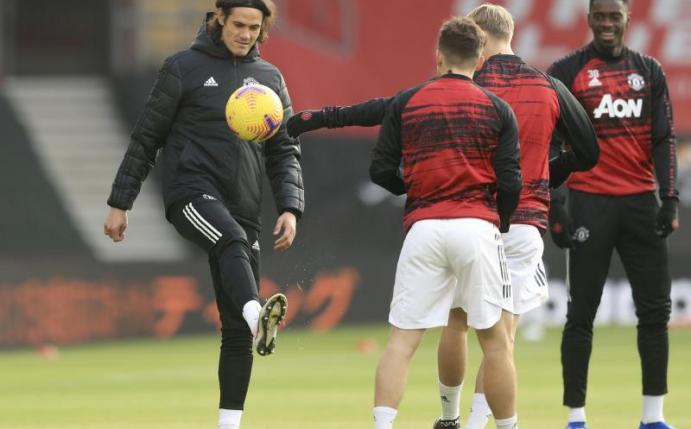Edinson Cavani (l) kam erst zur Halbzeit, drehte dann aber für Manchester United die Partie. Foto: Adam Davy/PA Pool/AP/dpa