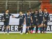 Die Bochumer Mannschaft bejubelt das 3:0 gegen Fortuna Düsseldorf. Foto: Roland Weihrauch/dpa
