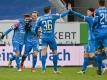 Holstein Kiel gewann auch bei Jahn Regensburg. Foto: Armin Weigel/dpa